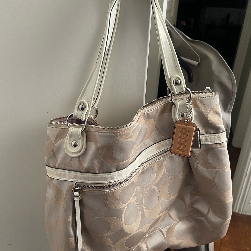 Tan & white Coach bag. Never used. Great condition!
